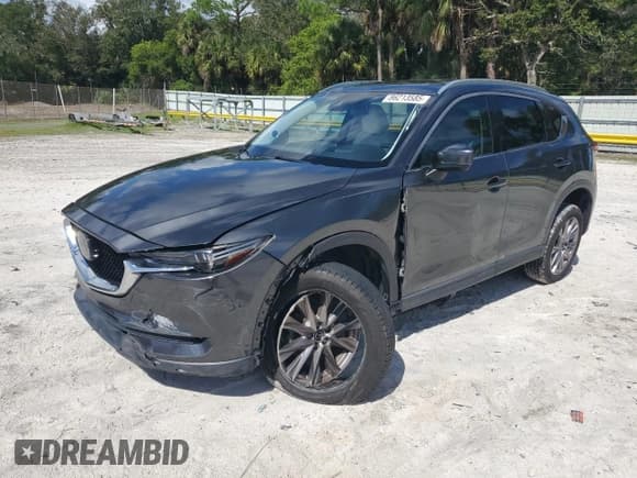 ✅ 2019 Mazda CX-5 Grand Touring • VIN: JM3KFADM7K0622051 • Lot: 86213585. Listed on Copart with 68,022 mi. Free auction sales archive from the USA and detailed vehicle history report at DreamBid. Image 1.