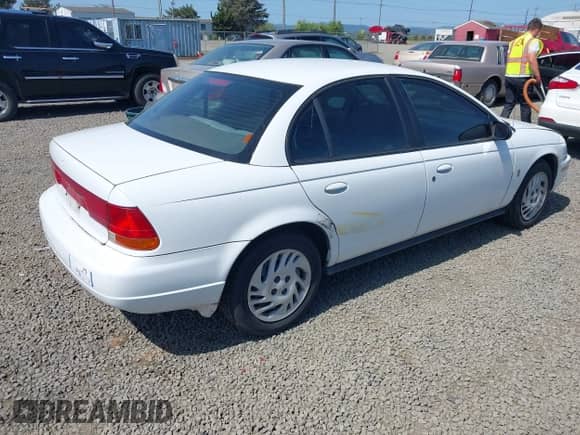 1998 Saturn SL с VIN 1G8ZK5273WZ251392, выставлен на аукционе IAAI как лот 42149274 с пробегом 80 544 миль миль и . История ставок и продаж доступна на DreamBid. Изображение 4.