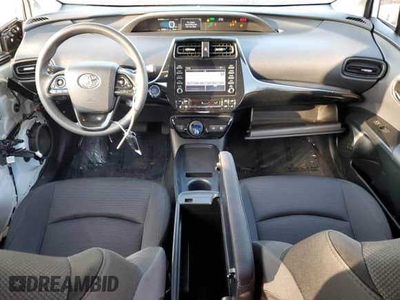 2020 Toyota Prius L Eco с VIN JTDKARFUXL3119679, выставлен на аукционе Copart как лот 77231514 с пробегом 69 861 миль миль и Списание • Salvage title. История ставок и продаж доступна на DreamBid. Изображение 8.