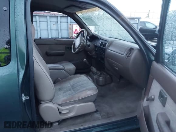✅ 1999 Toyota Tacoma • VIN: 4TAVL52N6XZ530719 • Lot: 43753647. Listed on IAAI with 240,331 mi. Free auction sales archive from the USA and detailed vehicle history report at DreamBid. Image 5.