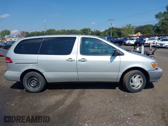 ✅ 2003 Toyota Sienna LE • VIN: 4T3ZF13C43U535740 • Lot: 43160504. Listed on IAAI with 133,134 mi. Free auction sales archive from the USA and detailed vehicle history report at DreamBid. Image 13.