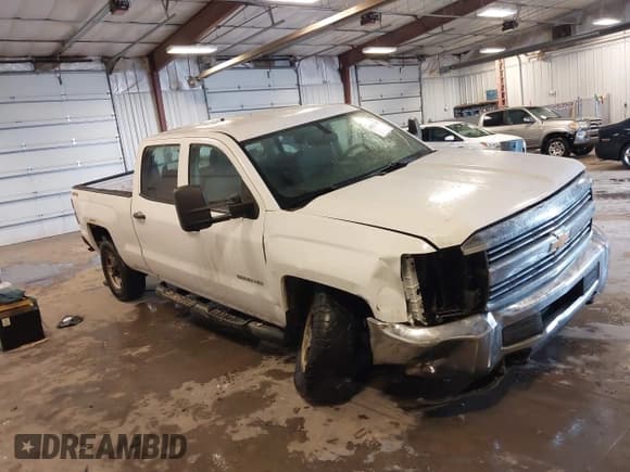 ✅ 2015 Chevrolet Silverado 2500HD Work Truck • VIN: 1GC1KUEG8FF173413 • Lot: 41822540. Listed on IAAI with 198,888 mi. Free auction sales archive from the USA and detailed vehicle history report at DreamBid. Image 1.