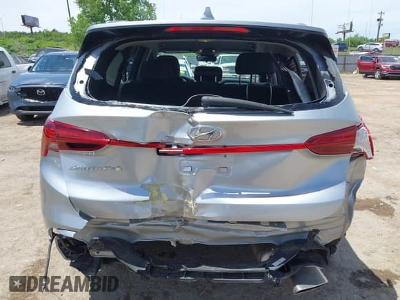 ✅ 2022 Hyundai Santa Fe SE • VIN: 5NMS14AJ7NH393037 • Lot: 42276818. Listed on IAAI with 77,656 mi. Free auction sales archive from the USA and detailed vehicle history report at DreamBid. Image 17.