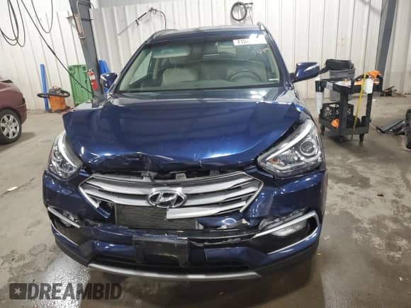 ✅ 2017 Hyundai Santa Fe Ultimate • VIN: 5XYZUDLA6HG461054 • Lot: 71547033. Wystawiony na Copart z przebiegiem 78 359 mil mil. Skorzystaj z bezpłatnego archiwum sprzedaży aukcyjnych z USA i zobacz szczegółowy raport historii pojazdu na DreamBid. Zdjęcie 5.