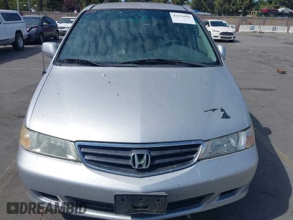 ✅ 2002 Honda Odyssey EX-L • VIN: 2HKRL189X2H561691 • Lot: 43251896. Wystawiony na IAAI z przebiegiem 208 458 mil. Bezpłatny archiwum sprzedaży aukcyjnych z USA i szczegółowy raport historii pojazdu na DreamBid. Zdjęcie 6.