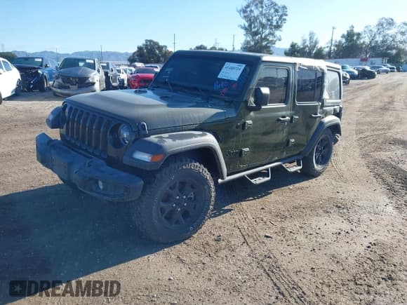✅ 2022 Jeep Wrangler Unlimited High Tide • VIN: 1C4HJXDG5NW113205 • Lot: 41488724. Listed on IAAI with 30,446 mi. Free auction sales archive from the USA and detailed vehicle history report at DreamBid. Image 2.