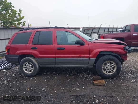 ✅ 2002 Jeep Grand Cherokee Laredo • VIN: 1J4GW48S82C316851 • Lot: 43260328. Listed on IAAI with 167,363 mi. Free auction sales archive from the USA and detailed vehicle history report at DreamBid. Image 14.