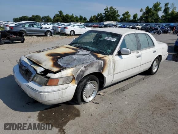 ✅ 1999 Mercury Grand Marquis LS • VIN: 2MEFM75W1XX736301 • Лот: 69645975. Опубликован ранее на Copart с пробегом Не указан. Бесплатный доступ к архиву аукционных продаж из США и подробный отчёт об истории автомобиля на DreamBid. Изображение 1.