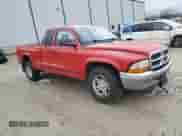 2003 Dodge Dakota SLT with VIN 1D7HL42N93S105421, listed as a Copart auction lot 83088264 with 210,194 mi miles and Salvage title. Bid and sale history available at DreamBid. Image 4.