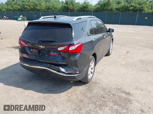 ✅ 2019 Chevrolet Equinox Premier • VIN: 2GNAXNEV4K6184569 • Lot: 42670537. Listed on IAAI with 163,594 mi. Free auction sales archive from the USA and detailed vehicle history report at DreamBid. Image 4.