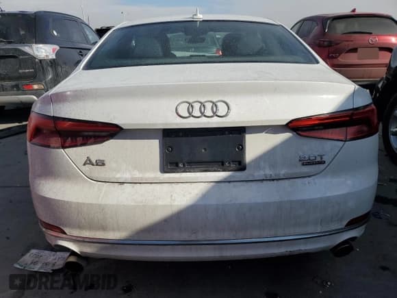 ✅ 2018 Audi A5 Premium • VIN: WAUNNAF55JA001699 • Лот: 43041905. Опубликован ранее на Copart с пробегом 55 938 миль. Бесплатный доступ к архиву аукционных продаж из США и подробный отчёт об истории автомобиля на DreamBid. Изображение 6.