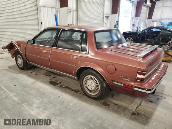 ✅ 1986 Buick Century Limited • VIN: 1G4AL19R1G6480068 • Лот: 90778295. Опубликован ранее на Copart с пробегом 87 126 миль. Бесплатный доступ к архиву аукционных продаж из США и подробный отчёт об истории автомобиля на DreamBid. Изображение 2.