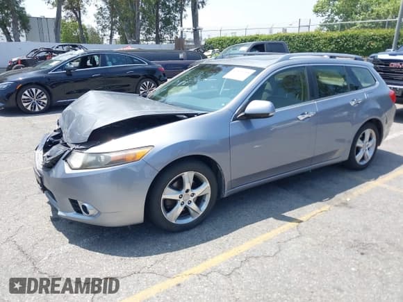 ✅ 2012 Acura TSX Technology • VIN: JH4CW2H67CC003799 • Lot: 42171355. Listed on IAAI with 124,184 mi. Free auction sales archive from the USA and detailed vehicle history report at DreamBid. Image 2.