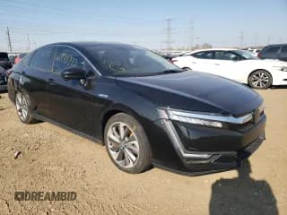 ✅ 2018 Honda Clarity Touring • VIN: JHMZC5F39JC019173 • Лот: 66970772. Опубликован ранее на Copart с пробегом 28 674 миль. Бесплатный доступ к архиву аукционных продаж из США и подробный отчёт об истории автомобиля на DreamBid. Изображение 1.