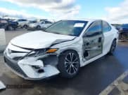 ✅ 2018 Toyota Camry XLE • VIN: 4T1B11HKXJU557537 • Лот: 43556168. Опубликован ранее на IAAI с пробегом 150 267 миль. Бесплатный доступ к архиву аукционных продаж из США и подробный отчёт об истории автомобиля на DreamBid. Изображение 2.