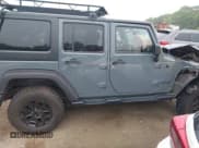 ✅ 2015 Jeep Wrangler Unlimited Sport • VIN: 1C4BJWDG5FL641703 • Lot: 42424235. Wystawiony na IAAI z przebiegiem 65 866 mil. Bezpłatny archiwum sprzedaży aukcyjnych z USA i szczegółowy raport historii pojazdu na DreamBid. Zdjęcie 14.