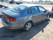 ✅ 2018 Volkswagen Jetta S • VIN: 3VW2B7AJ8JM211574 • Lot: 43322472. Wystawiony na IAAI z przebiegiem 162 073 mil. Bezpłatny archiwum sprzedaży aukcyjnych z USA i szczegółowy raport historii pojazdu na DreamBid. Zdjęcie 4.