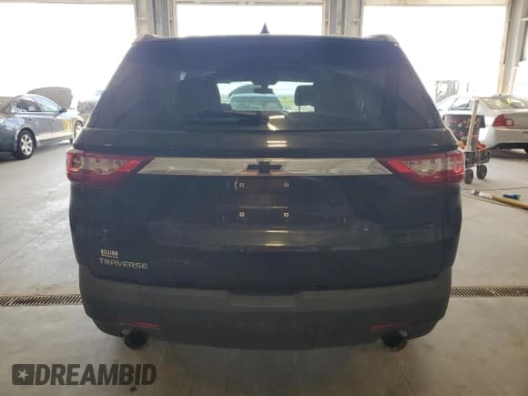 ✅ 2019 Chevrolet Traverse LS • VIN: 1GNERFKW0KJ141011 • Lot: 69295155. Wystawiony na Copart z przebiegiem 129 258 mil. Bezpłatny archiwum sprzedaży aukcyjnych z USA i szczegółowy raport historii pojazdu na DreamBid. Zdjęcie 6.