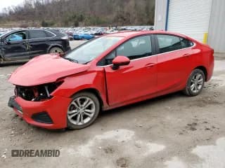 ✅ 2019 Chevrolet Cruze LT • VIN: 1G1BE5SM4K7124721 • Lot: 40444923. Listed on Copart with 87,164 mi. Free auction sales archive from the USA and detailed vehicle history report at DreamBid. Image 1.