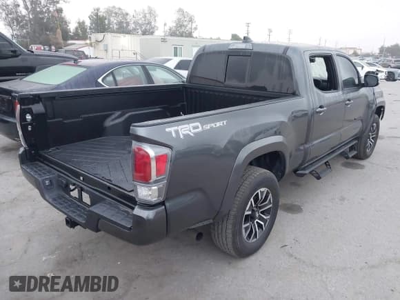 ✅ 2023 Toyota Tacoma SR5 • VIN: 3TMBZ5DN3PM038380 • Lot: 43543877. Listed on IAAI with 22,417 mi. Free auction sales archive from the USA and detailed vehicle history report at DreamBid. Image 4.