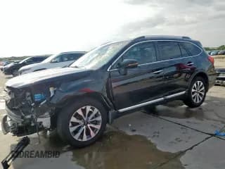 ✅ 2019 Subaru Outback Touring • VIN: 4S4BSATC6K3284858 • Лот: 63808065. Опубликован ранее на Copart с пробегом 69 499 миль. Бесплатный доступ к архиву аукционных продаж из США и подробный отчёт об истории автомобиля на DreamBid. Изображение 1.
