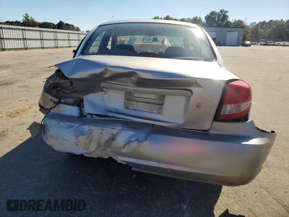 ✅ 2005 Kia Rio • VIN: KNADC125956382747 • Lot: 82539335. Listed on Copart with 166,122 mi. Free auction sales archive from the USA and detailed vehicle history report at DreamBid. Image 6.