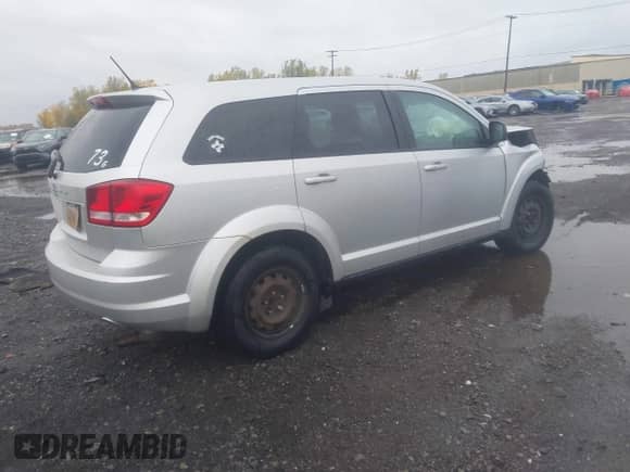 2012 Dodge Journey American Value with VIN 3C4PDCAB4CT154190, listed as a IAAI auction lot 43485900 with 161,305 mi miles and . Bid and sale history available at DreamBid. Image 4.