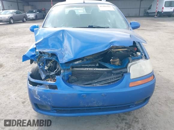 2006 Chevrolet Aveo LS z VIN KL1TD56696B543863, wystawiony jako IAAI lot #41446969 z przebiegiem 222 866 mil mil oraz . Historia ofert i sprzedaży dostępna na DreamBid. Obrazek 12.