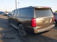 ✅ 2016 Chevrolet Suburban LTZ • VIN: 1GNSCJKC6GR415933 • Lot: 42956452. Wystawiony na IAAI z przebiegiem 180 352 mil. Bezpłatny archiwum sprzedaży aukcyjnych z USA i szczegółowy raport historii pojazdu na DreamBid. Zdjęcie 3.