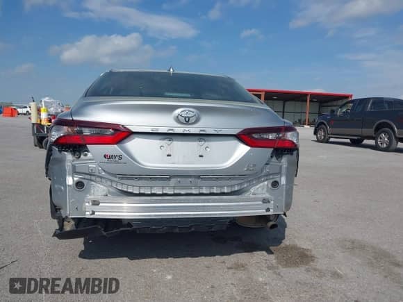2021 Toyota Camry LE z VIN 4T1C11BK2MU027838, wystawiony jako IAAI lot #39140621 z przebiegiem 57 812 mil mil oraz . Historia ofert i sprzedaży dostępna na DreamBid. Obrazek 17.