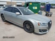 ✅ 2017 Audi A8 Sport • VIN: WAU43AFD6HN002839 • Лот: 43015451. Опубликован ранее на IAAI с пробегом 169 409 миль. Бесплатный доступ к архиву аукционных продаж из США и подробный отчёт об истории автомобиля на DreamBid. Изображение 1.