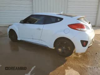✅ 2014 Hyundai Veloster Turbo • VIN: KMHTC6AE9EU183007 • Lot: 77971954. Wystawiony na Copart z przebiegiem 105 502 mil. Bezpłatny archiwum sprzedaży aukcyjnych z USA i szczegółowy raport historii pojazdu na DreamBid. Zdjęcie 2.