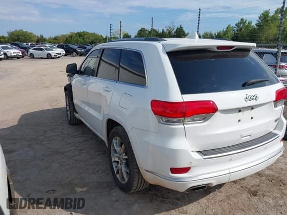 ✅ 2015 Jeep Grand Cherokee Summit • VIN: 1C4RJEJG5FC105296 • Lot: 43231201. Listed on IAAI with 124,311 mi. Free auction sales archive from the USA and detailed vehicle history report at DreamBid. Image 3.
