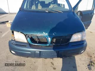 ✅ 1999 Pontiac Montana • VIN: 1GMDX03E0XD270185 • Lot: 41742018. Wystawiony na IAAI z przebiegiem 198 738 mil. Bezpłatny archiwum sprzedaży aukcyjnych z USA i szczegółowy raport historii pojazdu na DreamBid. Zdjęcie 6.