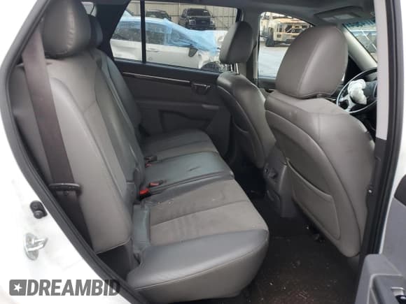 ✅ 2012 Hyundai Santa Fe SE • VIN: 5XYZH4AG2CG097607 • Lot: 79174504. Listed on Copart with 120,830 mi. Free auction sales archive from the USA and detailed vehicle history report at DreamBid. Image 11.