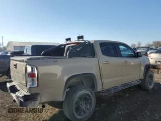 ✅ 2021 Chevrolet Colorado 4WD ZR2 • VIN: 1GCGTEEN2M1131888 • Лот: 43362985. Опубликован ранее на Copart с пробегом 51 223 миль. Бесплатный доступ к архиву аукционных продаж из США и подробный отчёт об истории автомобиля на DreamBid. Изображение 3.