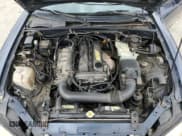 ✅ 1999 Mazda MX-5 Miata • VIN: JM1NB3534X0108667 • Lot: 84275075. Listed on Copart with 159,579 mi. Free auction sales archive from the USA and detailed vehicle history report at DreamBid. Image 11.