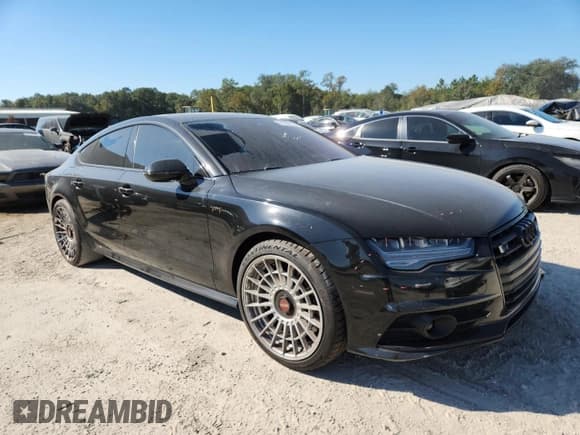 ✅ 2016 Audi S7 • VIN: WAUW2BFC9GN135490 • Лот: 91205115. Опубликован ранее на Copart с пробегом 113 980 миль. Бесплатный доступ к архиву аукционных продаж из США и подробный отчёт об истории автомобиля на DreamBid. Изображение 4.