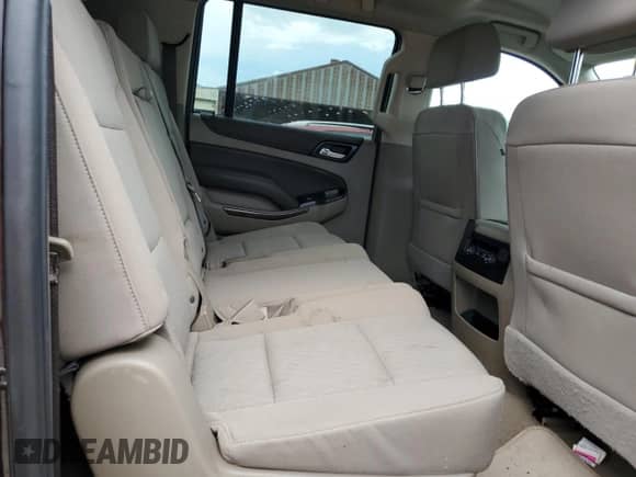 2020 Chevrolet Suburban LS z VIN 1GNSCGKC7LR218296, wystawiony jako Copart lot #61767105 z przebiegiem 118 405 mil mil oraz Szkoda całkowita • Salvage title. Historia ofert i sprzedaży dostępna na DreamBid. Obrazek 11.