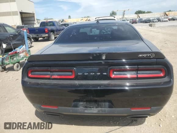 2021 Dodge Challenger SRT Hellcat with VIN 2C3CDZC99MH680244, listed as a Copart auction lot 56312265 with 30,057 mi miles and Salvage title. Bid and sale history available at DreamBid. Image 6.