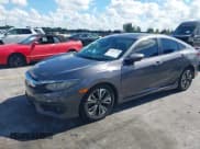✅ 2017 Honda Civic EX-T • VIN: 2HGFC1F34HH640486 • Lot: 43007728. Listed on IAAI with 132,879 mi. Free auction sales archive from the USA and detailed vehicle history report at DreamBid. Image 17.