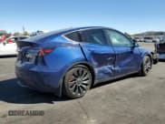 ✅ 2022 Tesla Model Y Performance • VIN: 7SAYGDEF8NF406574 • Lot: 80165595. Listed on Copart with 83,261 mi. Free auction sales archive from the USA and detailed vehicle history report at DreamBid. Image 3.