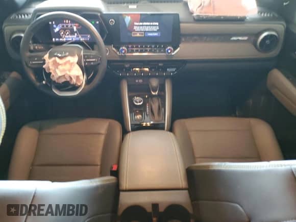 2023 Chevrolet Colorado 4WD ZR2 с VIN 1GCPTFEK1P1212882, выставлен на аукционе Copart как лот 71502184 с пробегом 12 342 миль миль и Списание • Salvage title. История ставок и продаж доступна на DreamBid. Изображение 8.