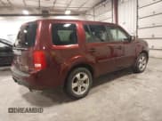 ✅ 2012 Honda Pilot EX-L • VIN: 5FNYF4H50CB078423 • Lot: 43590106. Listed on IAAI with 197,074 mi. Free auction sales archive from the USA and detailed vehicle history report at DreamBid. Image 4.