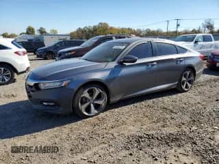 2018 Honda Accord EX-L z VIN 1HGCV1F58JA047698, wystawiony jako Copart lot #87263075 z przebiegiem Nie podano mil oraz Szkoda całkowita • Salvage title. Historia ofert i sprzedaży dostępna na DreamBid. Obrazek 1.