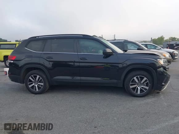 ✅ 2023 Volkswagen Atlas SE • VIN: 1V2LP2CA1PC540019 • Lot: 43025541. Listed on IAAI with 35,077 mi. Free auction sales archive from the USA and detailed vehicle history report at DreamBid. Image 13.