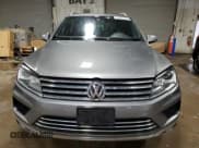 ✅ 2017 Volkswagen Touareg Wolfsburg Edition • VIN: WVGRF7BP9HD002693 • Лот: 71615172. Опубликован ранее на Copart с пробегом 62 226 миль. Бесплатный доступ к архиву аукционных продаж из США и подробный отчёт об истории автомобиля на DreamBid. Изображение 5.