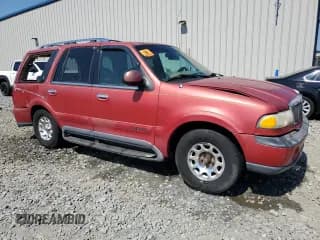 ✅ 1999 Lincoln Navigator • VIN: 5LMRU27A5XLJ37572 • Лот: 58487404. Опубликован ранее на Copart с пробегом 324 377 миль. Бесплатный доступ к архиву аукционных продаж из США и подробный отчёт об истории автомобиля на DreamBid. Изображение 4.