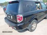 ✅ 2007 Honda Pilot EX-L • VIN: 5FNYF18667B010284 • Lot: 43232259. Listed on IAAI with 370,554 mi. Free auction sales archive from the USA and detailed vehicle history report at DreamBid. Image 6.