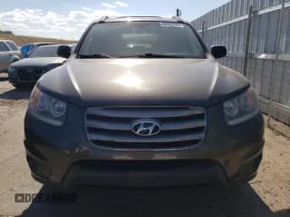 ✅ 2012 Hyundai Santa Fe GLS • VIN: 5XYZGDAB2CG152841 • Lot: 69445724. Listed on Copart with 131,617 mi. Free auction sales archive from the USA and detailed vehicle history report at DreamBid. Image 5.